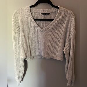 Woman’s SHEIN long sleeve crop top